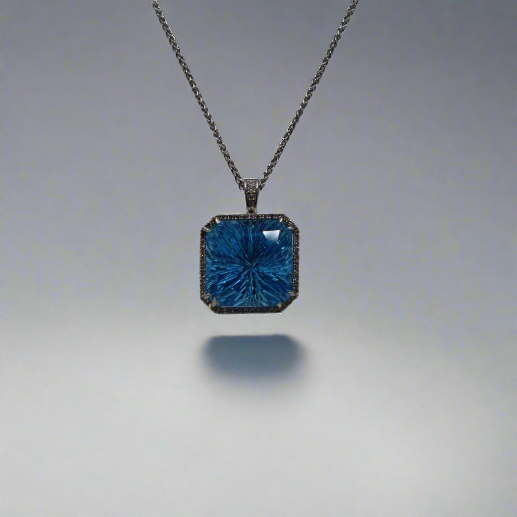 Platinum Starburst Blue Topaz Pendant and Chain