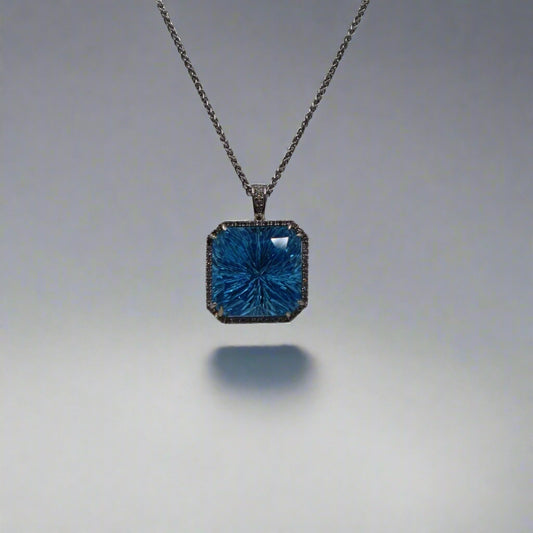Platinum Starburst Blue Topaz Pendant and Chain