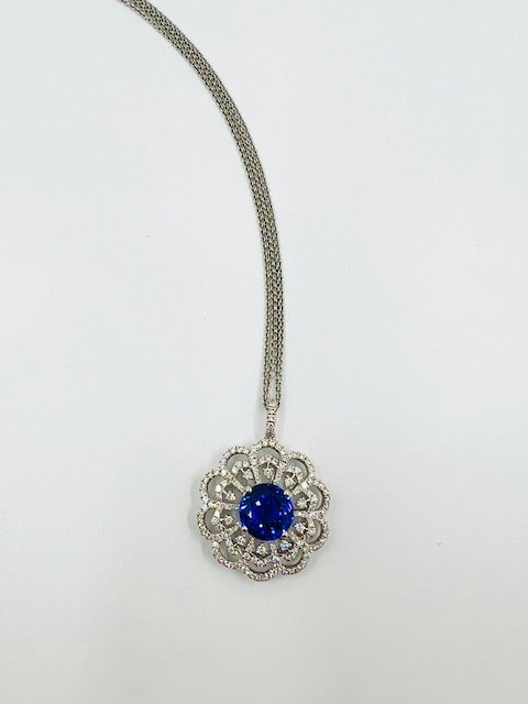 18ct Gold Tanzanite and diamond Flower Pendant