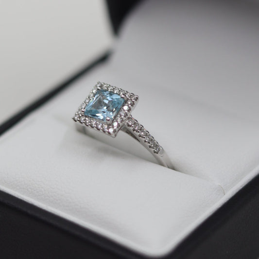 18ct White Gold Blue Topaz and Diamond Ring