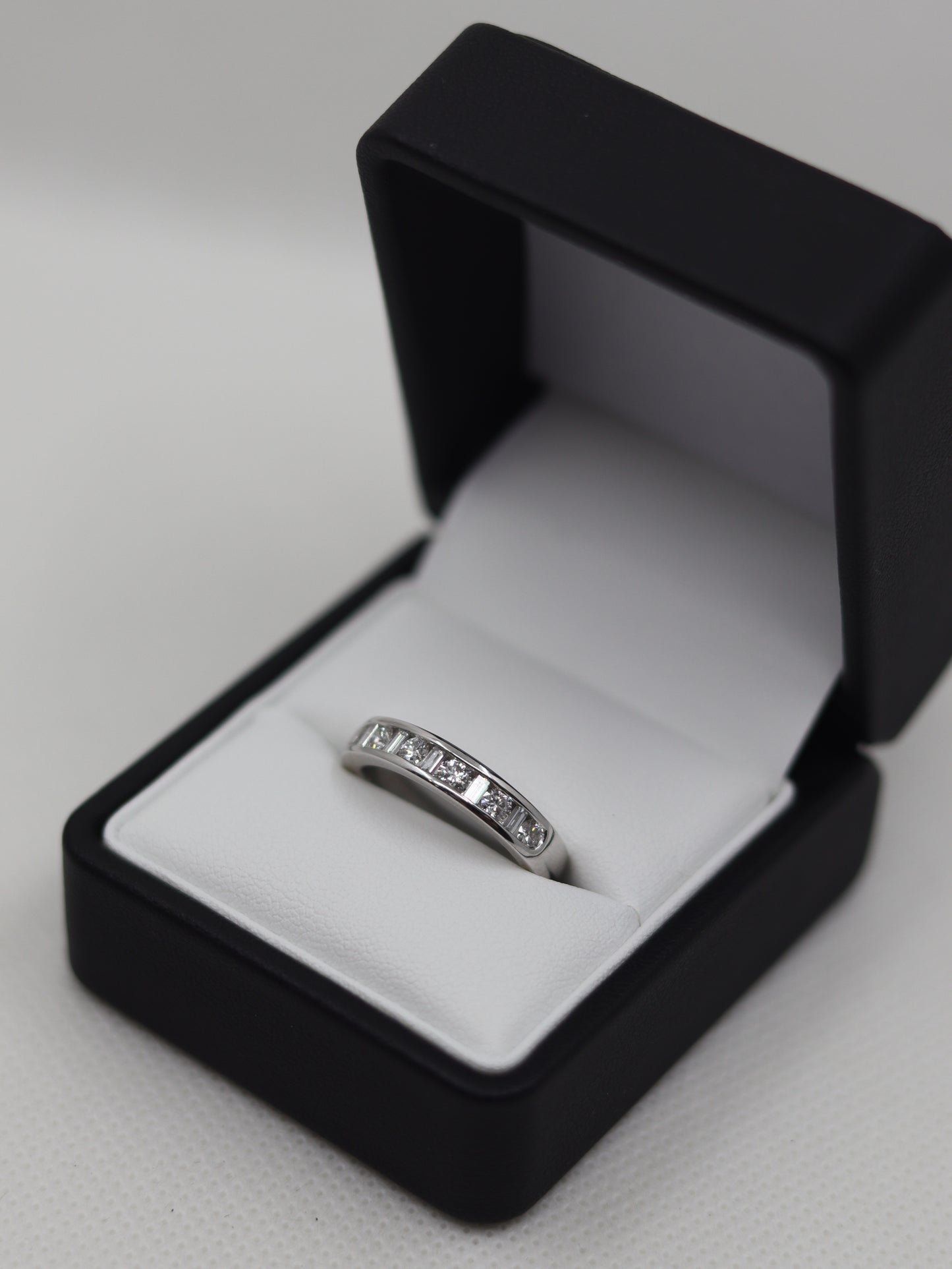 Platinum Channel Set Brilliant and Baguette Diamond Eternity Ring