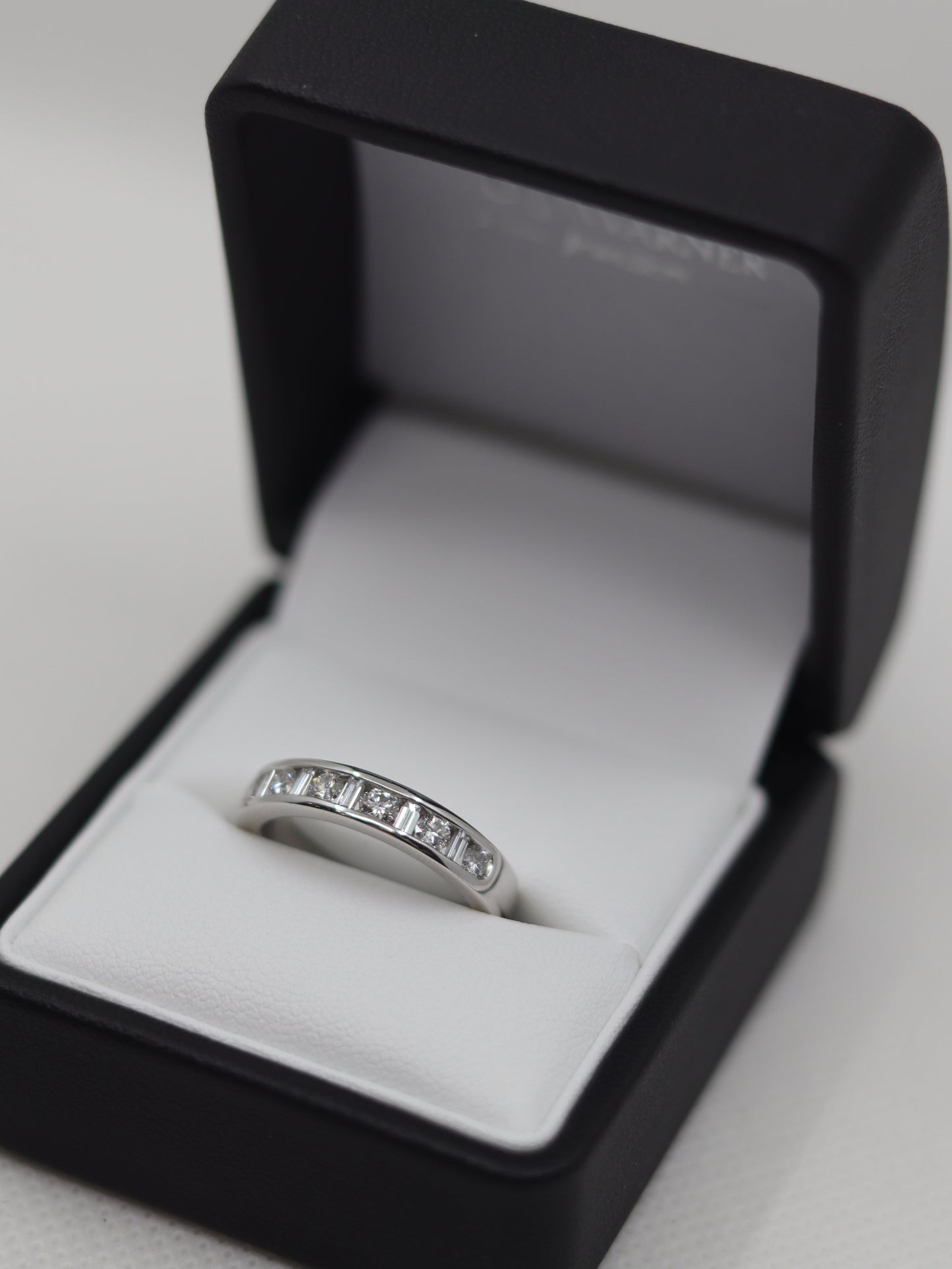 Platinum Channel Set Brilliant and Baguette Diamond Eternity Ring