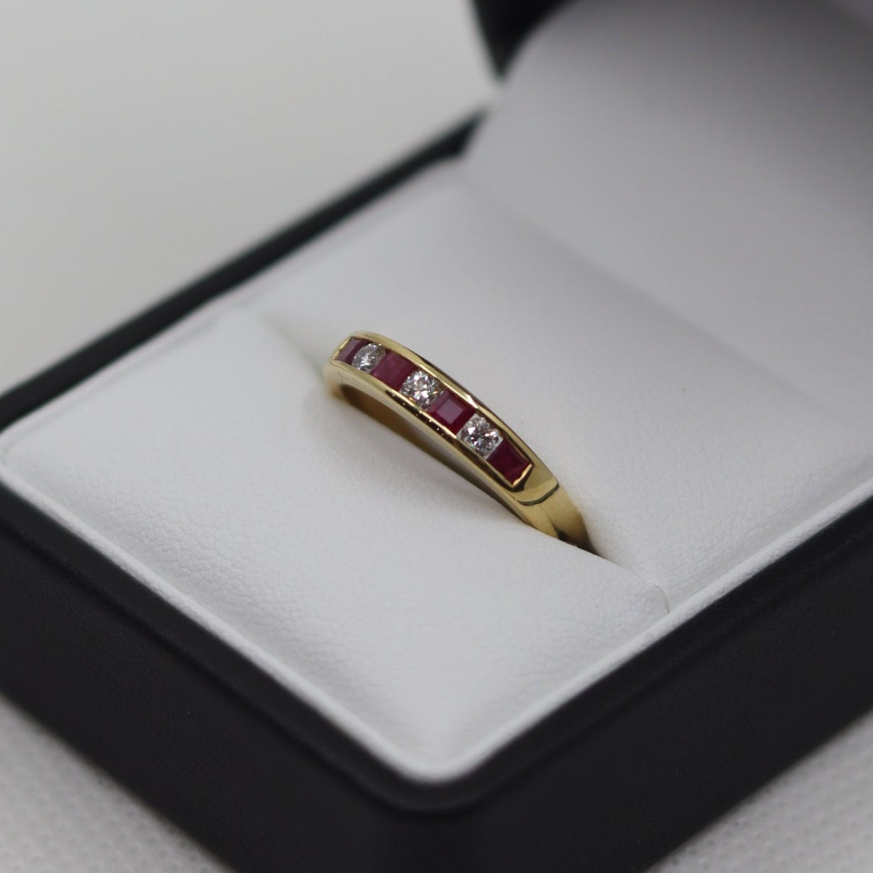 18ct Yellow Channel Set Ruby and Diamond Eternity Ring