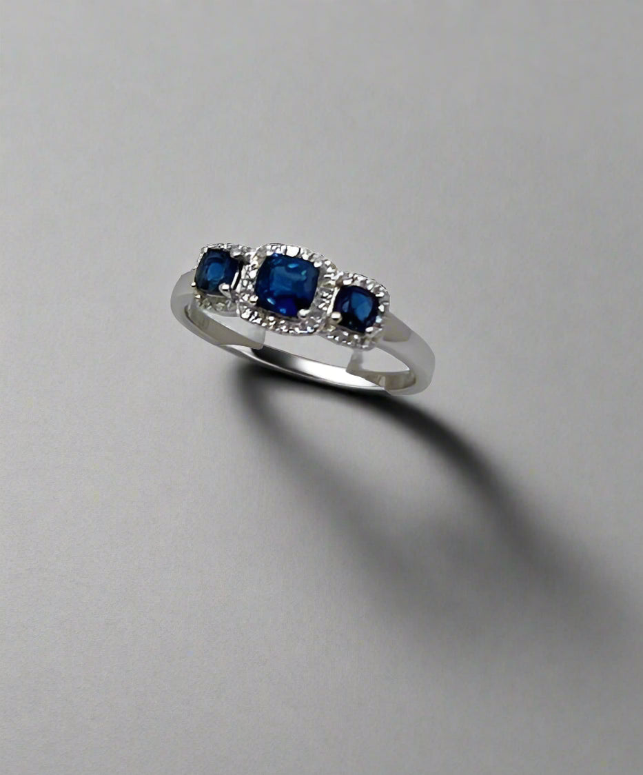 18ct White Gold Sapphire and Diamond 3 Stone Halo Ring