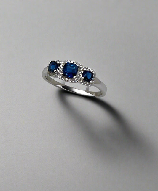 18ct White Gold Sapphire and Diamond 3 Stone Halo Ring