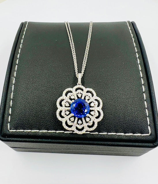 18ct Gold Tanzanite and diamond Flower Pendant